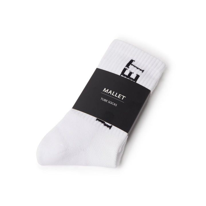 White tube socks with a black label on a white background